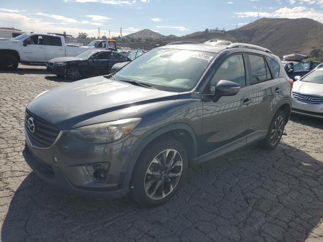 MAZDA CX-5 GT 2016 with VIN JM3KE2DY0G0774207 - Photo from auction