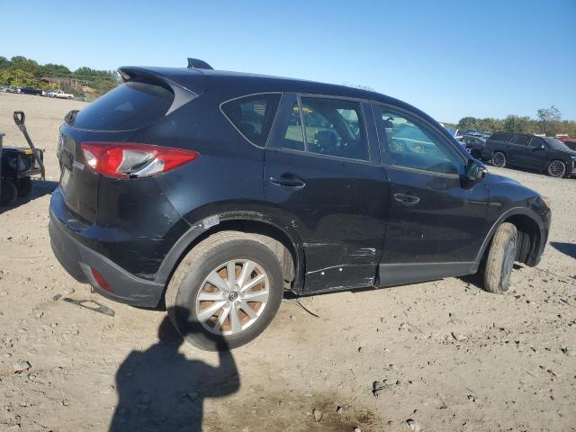 Photo 3 from auction – 2014 MAZDA CX-5 SPORT with VIN JM3KE2BEXE0375827