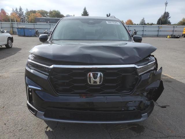 Photo 5 from auction – 2023 HONDA PILOT ELIT with VIN 5FNYG1H89PB050342