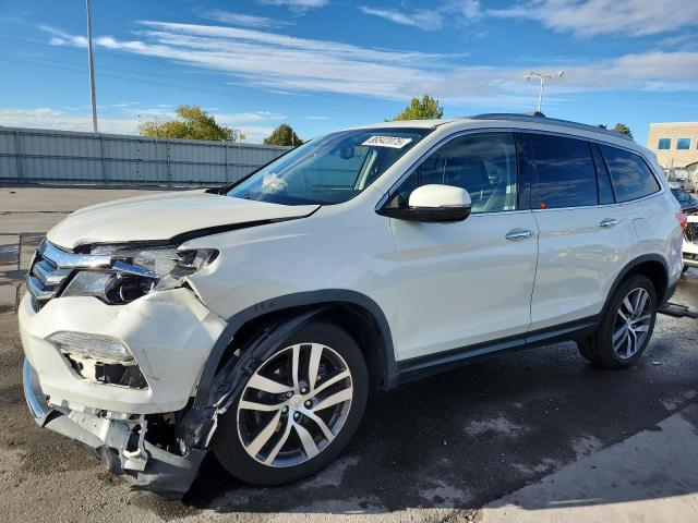 HONDA PILOT ELIT 2017 with VIN 5FNYF6H03HB062904 - Photo from auction