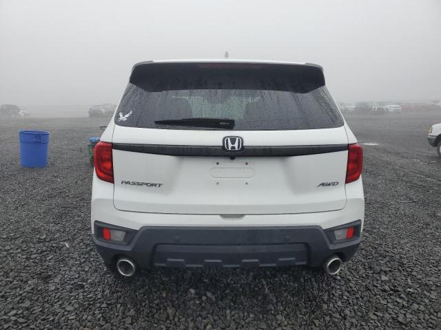 Photo 6 from auction – 2023 HONDA PASSPORT E with VIN 5FNYF8H50PB038291