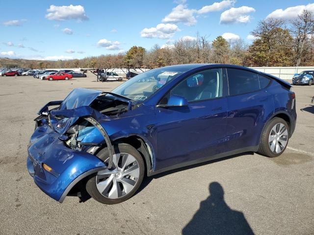 TESLA MODEL Y 2023 with VIN 7SAYGDEEXPA211843 - Photo from auction