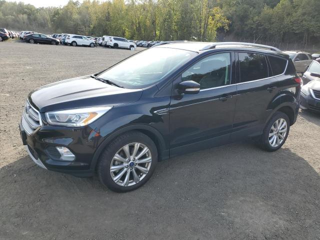 FORD ESCAPE TITANIUM 2017 with VIN 1FMCU9J9XHUD14869 - Photo from auction