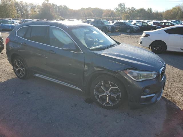 Photo 4 from auction – 2017 BMW X1 XDRIVE2 with VIN WBXHT3C33H5F80155
