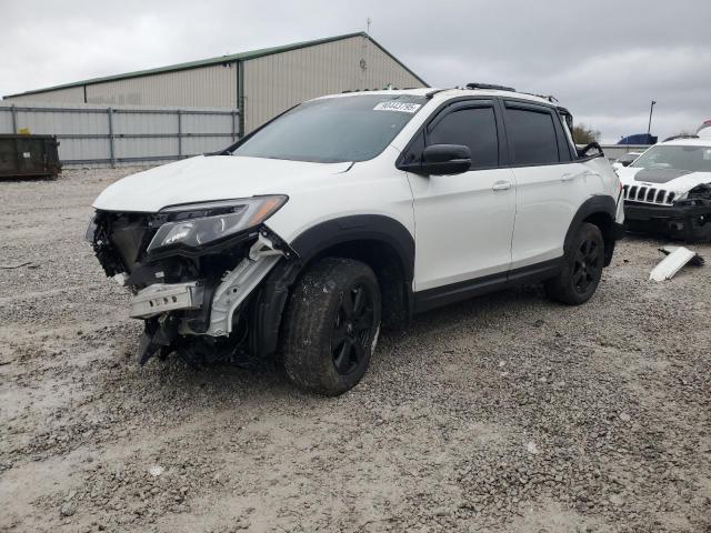 HONDA PILOT TRAI 2022 with VIN 5FNYF6H84NB096058 - Photo from auction