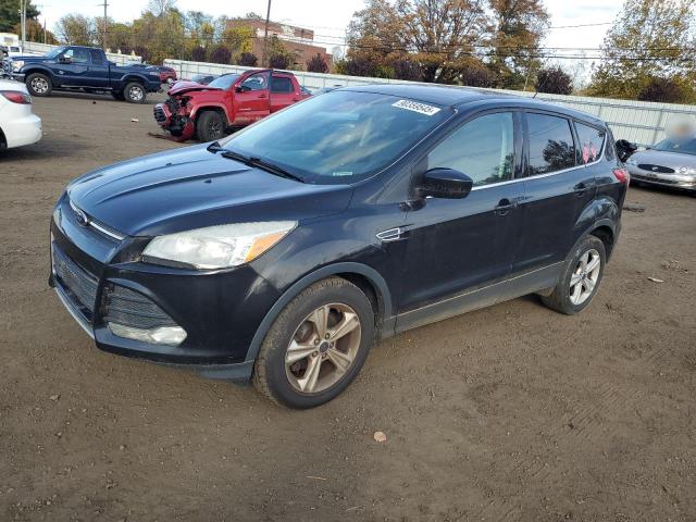 FORD ESCAPE SE 2014 with VIN 1FMCU9GX2EUD69656 - Photo from auction