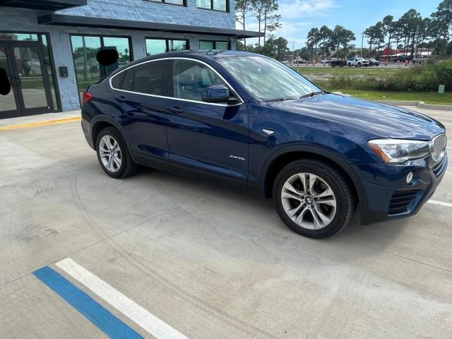 BMW X4 XDRIVE2 2015 with VIN 5UXXW3C54F0M89225 - Photo from auction