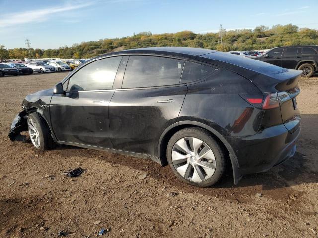 Photo 2 from auction – 2021 TESLA MODEL Y with VIN 5YJYGAEE9MF293770