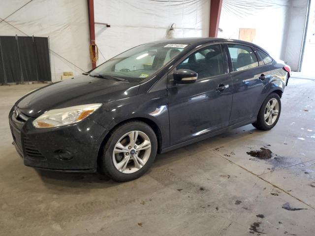FORD FOCUS SE 2013 with VIN 1FADP3F23DL282023 - Photo from auction