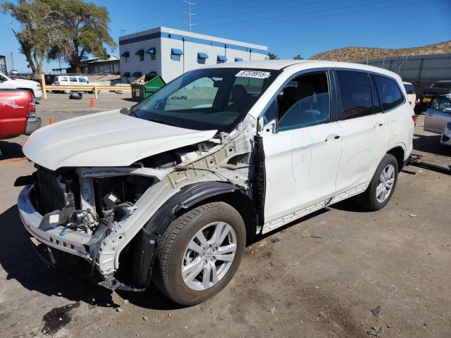HONDA PILOT LX 2018 with VIN 5FNYF6H12JB066490 - Photo from auction