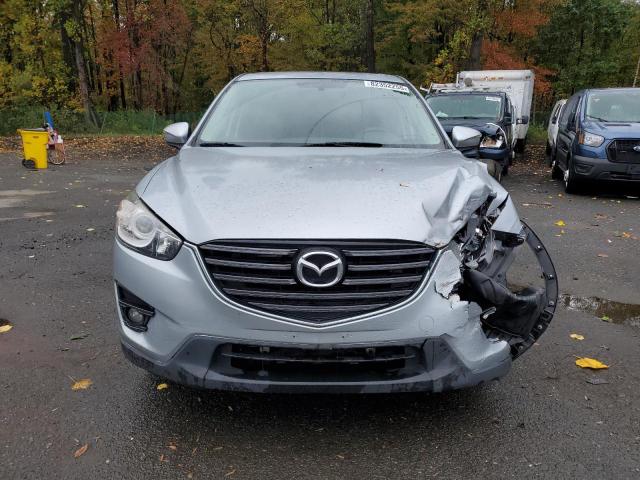 Photo 5 from auction – 2016 MAZDA CX-5 TOURI with VIN JM3KE4CYXG0860976