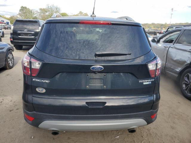 Photo 6 from auction – 2018 FORD ESCAPE TITANIUM with VIN 1FMCU9J94JUA60260