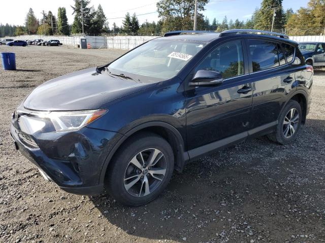 Photo 1 from auction – 2017 TOYOTA RAV4 XLE with VIN JTMRFREV4HJ113647