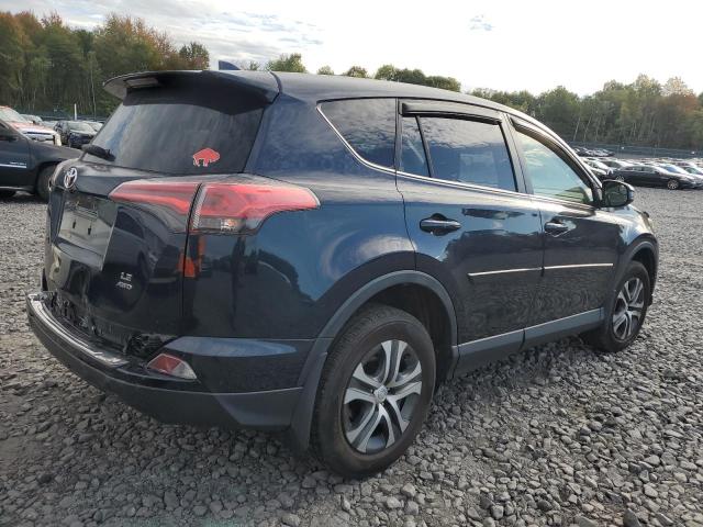 Photo 3 from auction – 2018 TOYOTA RAV4 LE with VIN JTMBFREV7JJ733822