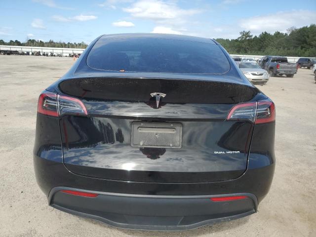 Photo 6 from auction – 2023 TESLA MODEL Y with VIN 7SAYGAEE8PF959654