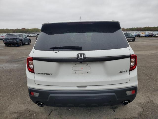 Photo 6 from auction – 2021 HONDA PASSPORT E with VIN 5FNYF8H53MB042377