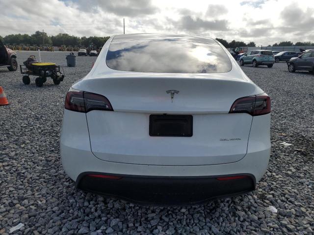 Photo 6 from auction – 2023 TESLA MODEL Y with VIN 7SAYGDEE3PA069402
