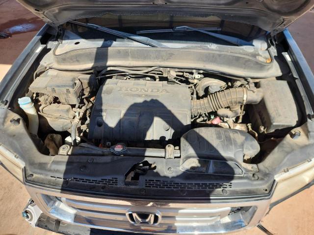 Photo 11 from auction – 2010 HONDA RIDGELINE with VIN 5FPYK1F54AB013981