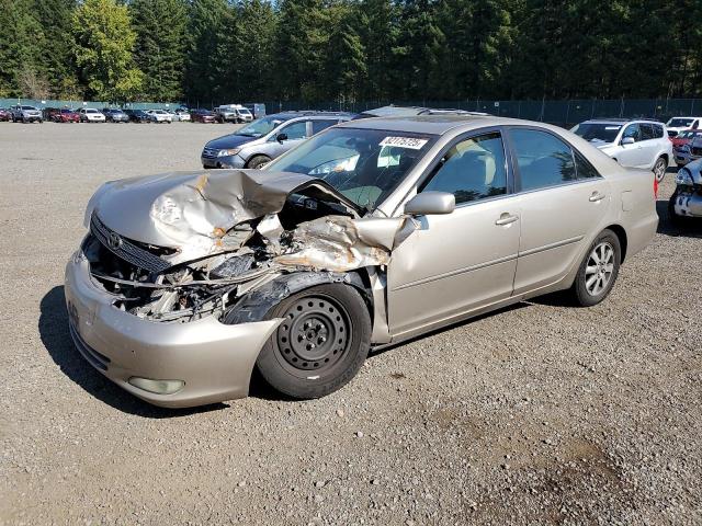 TOYOTA CAMRY LE 2004 with VIN JTDBF30KX40153887 - Photo from auction