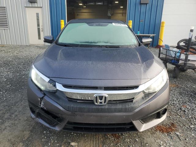 Photo 5 from auction – 2018 HONDA CIVIC EX with VIN 2HGFC2F80JH004283