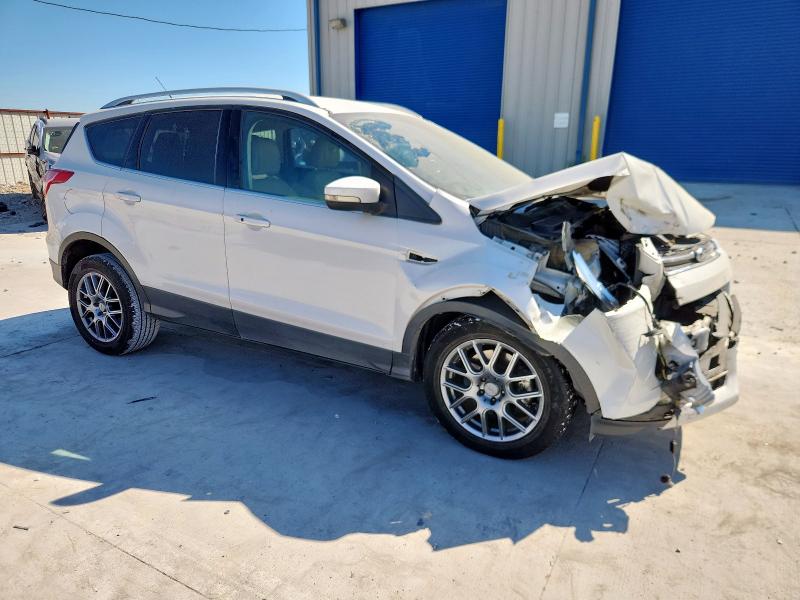 Photo 4 from auction – 2016 FORD ESCAPE TITANIUM with VIN 1FMCU0J98GUC91019