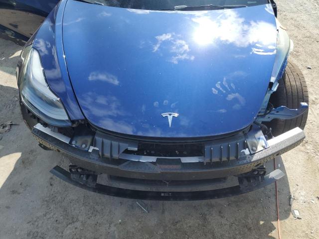 Photo 11 from auction – 2023 TESLA MODEL 3 with VIN 5YJ3E1EAXPF646535