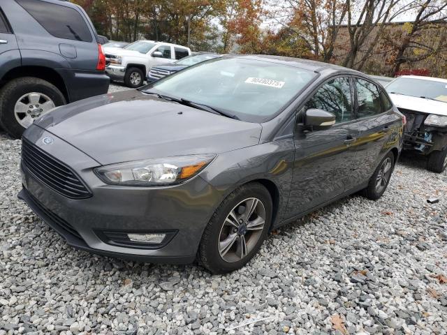 FORD FOCUS SE 2017 with VIN 1FADP3FEXHL301280 - Photo from auction