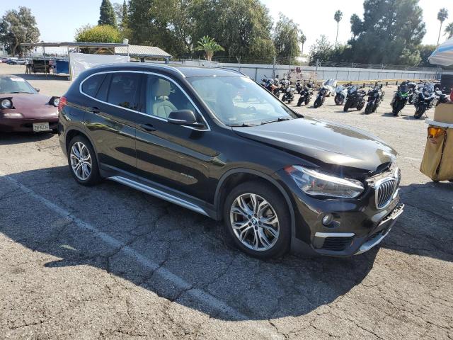 Photo 4 from auction – 2016 BMW X1 XDRIVE2 with VIN WBXHT3C36G5E53284
