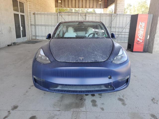 Photo 5 from auction – 2023 TESLA MODEL Y with VIN 7SAYGAEE7PF697030