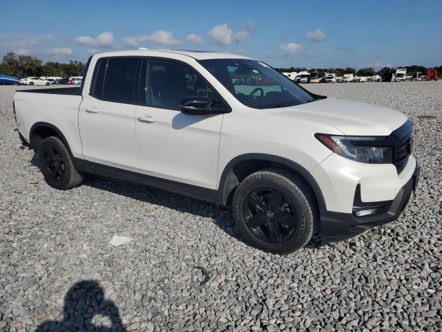 Photo 4 from auction – 2021 HONDA RIDGELINE with VIN 5FPYK3F81MB018341