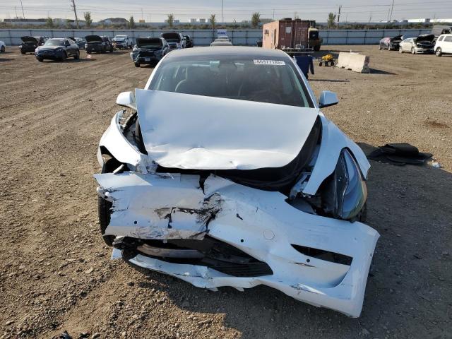 Photo 5 from auction – 2021 TESLA MODEL 3 with VIN 5YJ3E1EB7MF992742