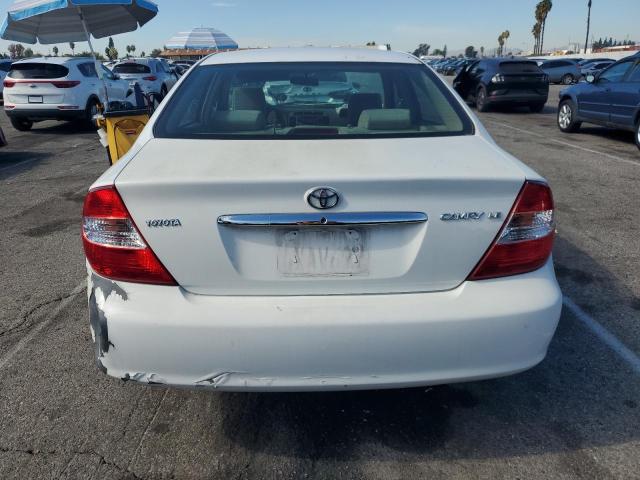 Photo 6 from auction – 2002 TOYOTA CAMRY LE with VIN JTDBE32K920080220