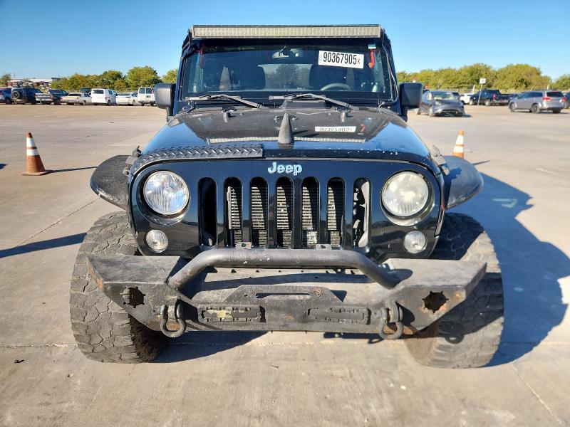 Photo 5 from auction – 2014 JEEP WRANGLER U with VIN 1C4BJWEG4EL147202