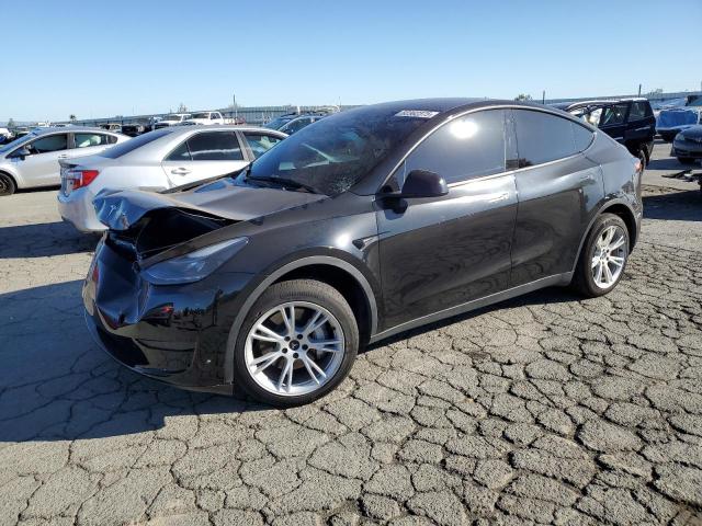 TESLA MODEL Y 2023 with VIN 7SAYGDEE9PF741725 - Photo from auction