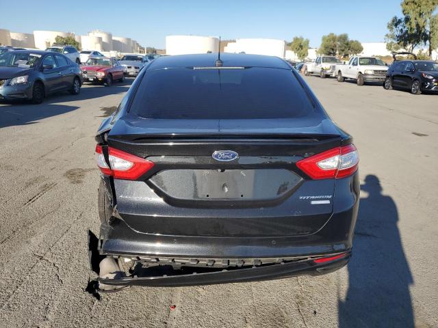 Photo 6 from auction – 2014 FORD FUSION TITANIUM with VIN 3FA6P0K95ER380421