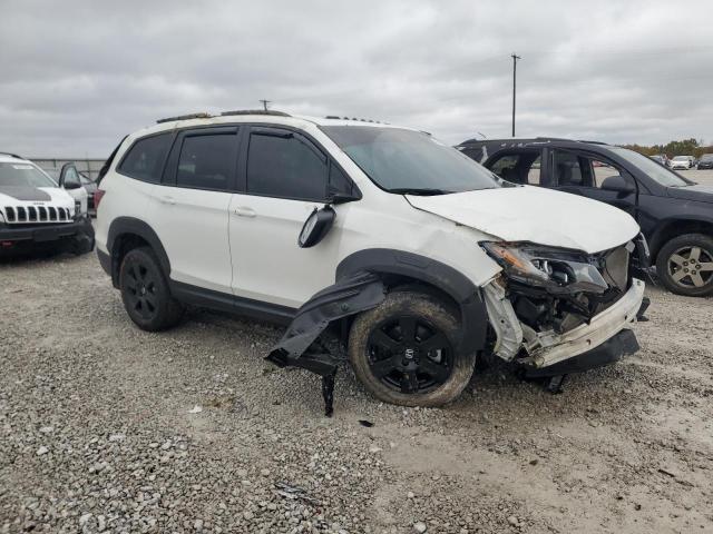 Photo 4 from auction – 2022 HONDA PILOT TRAI with VIN 5FNYF6H84NB096058
