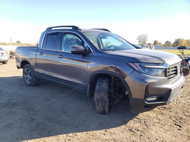 Photo 4 from auction – 2021 HONDA RIDGELINE with VIN 5FPYK3F57MB016423