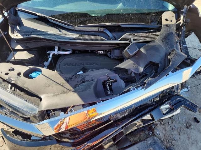 Photo 12 from auction – 2023 HONDA RIDGELINE with VIN 5FPYK3F74PB063172