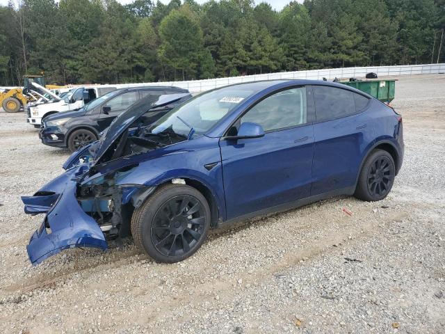 TESLA MODEL Y 2022 with VIN 7SAYGDEEXNF329469 - Photo from auction