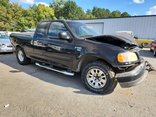Photo 4 from auction – 2003 FORD F150 with VIN 1FTRX17WX3NA11629