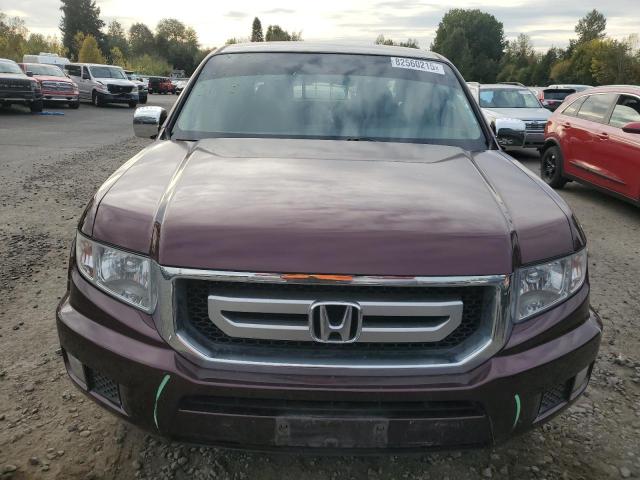 Photo 5 from auction – 2010 HONDA RIDGELINE with VIN 5FPYK1F47AB013822