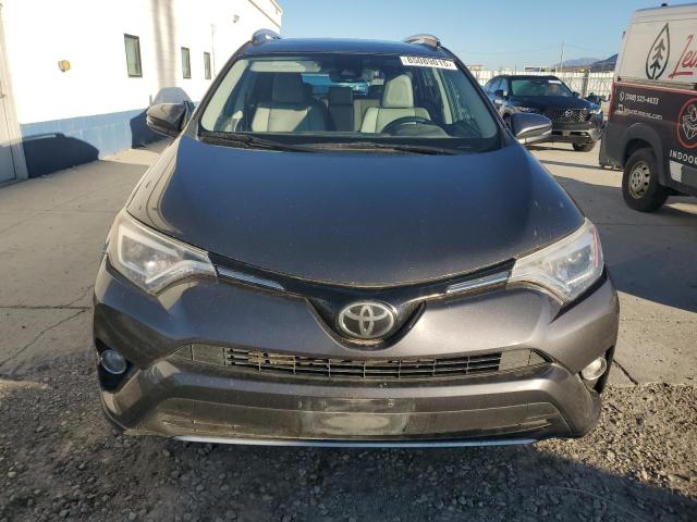Photo 5 from auction – 2018 TOYOTA RAV4 LIMITED with VIN 2T3DFREV3JW725307