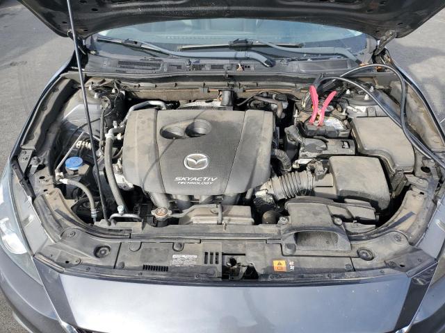 Photo 11 from auction – 2014 MAZDA 3 with VIN JM1BM1M76E1206788