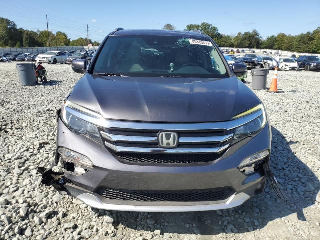 Photo 5 from auction – 2016 HONDA PILOT ELIT with VIN 5FNYF6H05GB050557