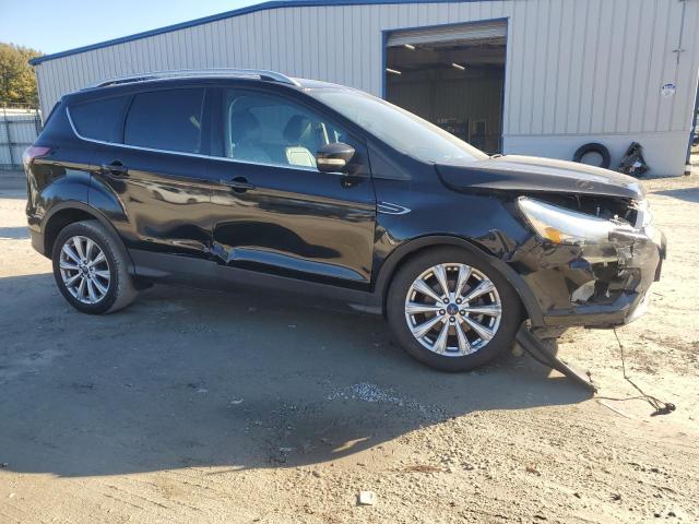 Photo 4 from auction – 2017 FORD ESCAPE TIT with VIN 1FMCU0JDXHUC60909