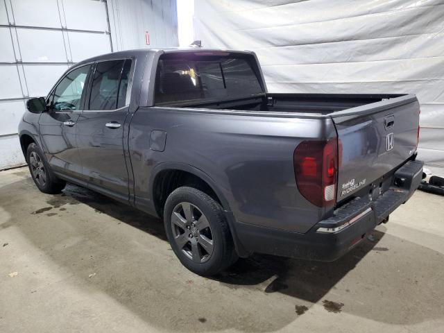 Photo 2 from auction – 2020 HONDA RIDGELINE with VIN 5FPYK3F74LB014581