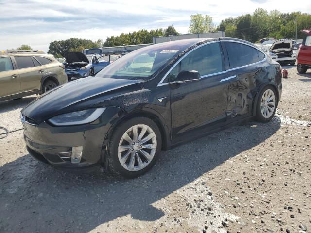 TESLA MODEL X 2018 with VIN 5YJXCDE28JF121577 - Photo from auction