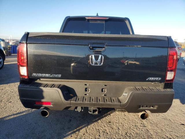 Photo 6 from auction – 2023 HONDA RIDGELINE with VIN 5FPYK3F56PB001223