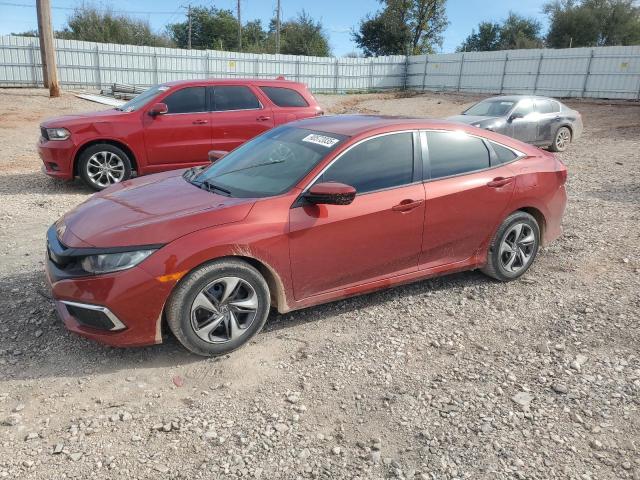 HONDA CIVIC LX 2020 with VIN 19XFC2F64LE012432 - Photo from auction