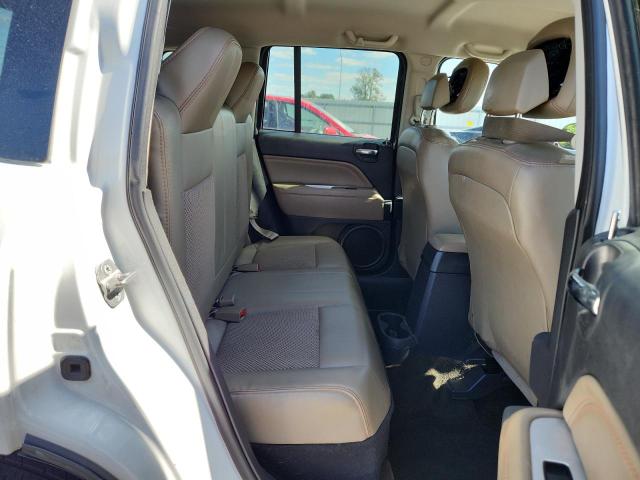 Photo 11 from auction – 2014 JEEP COMPASS LA with VIN 1C4NJCEB1ED690923